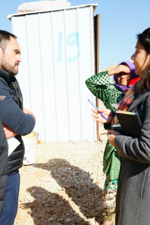 Humanitarian advisers from the U.K's Department for International Development talk to Syrian refugees in the Bekaa Valley, Lebanon, February 2017.