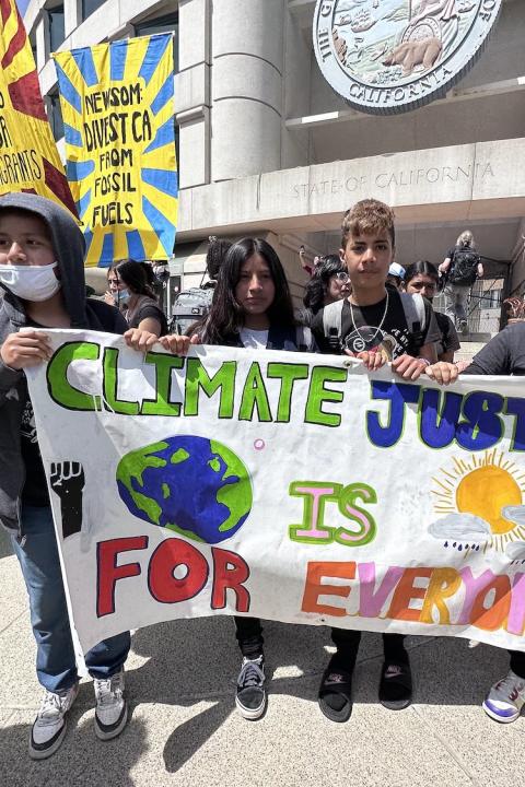 young people rally in front of california statehouse in support of climate justice