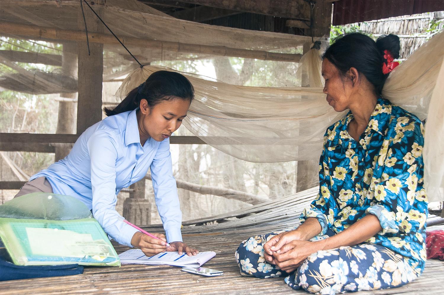 Two women participating in iDE's WASH sanitation program in Cambodia.