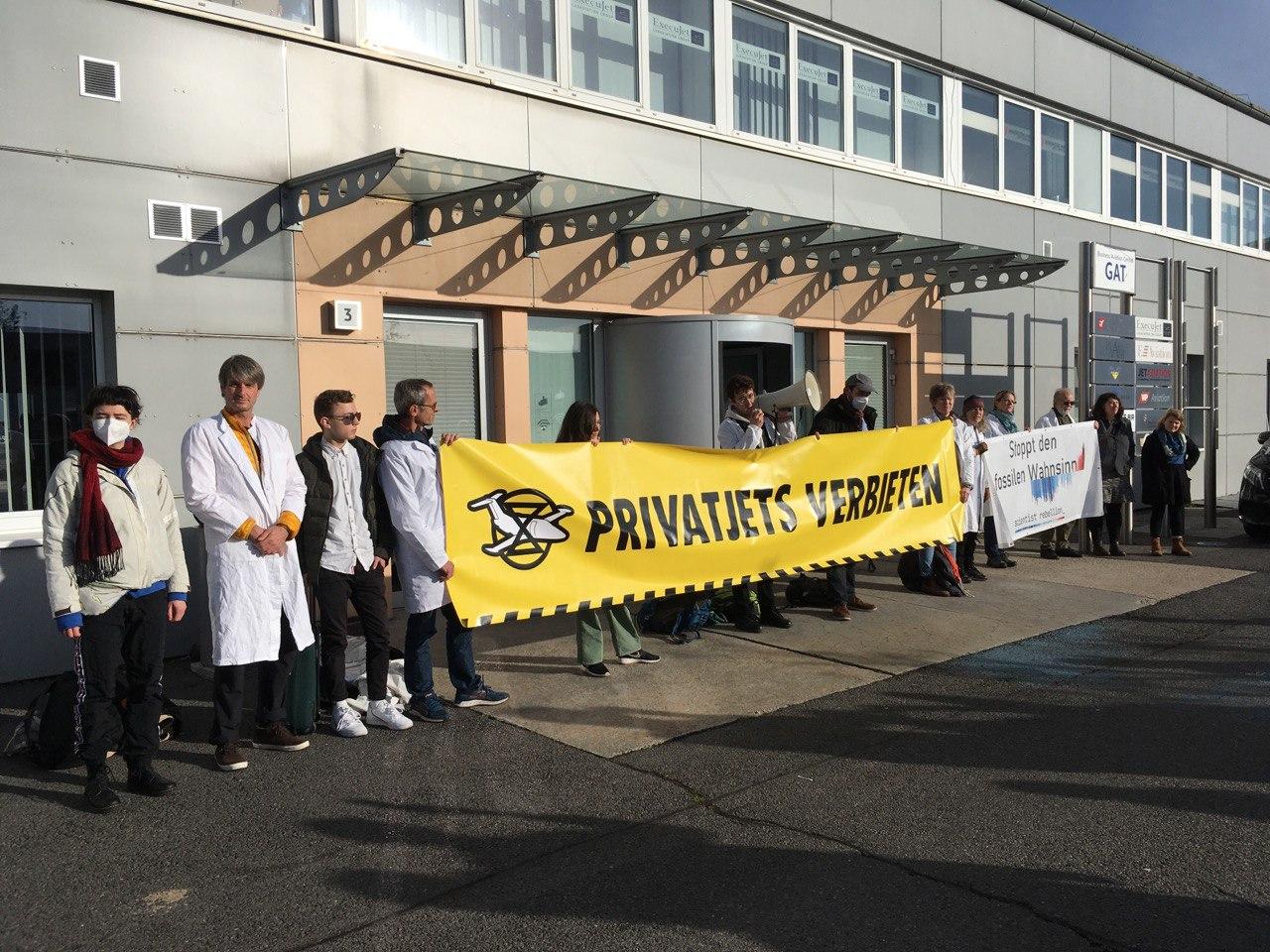 protest against private jets - A photo of activists from the Make Them Pay Campaign blocking access to a private jet terminal in Berlin in November 2022.