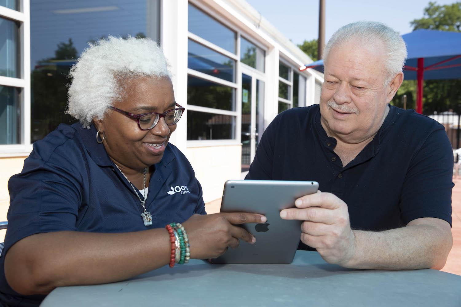 Accelerating Digital Equity - seniors using iPad