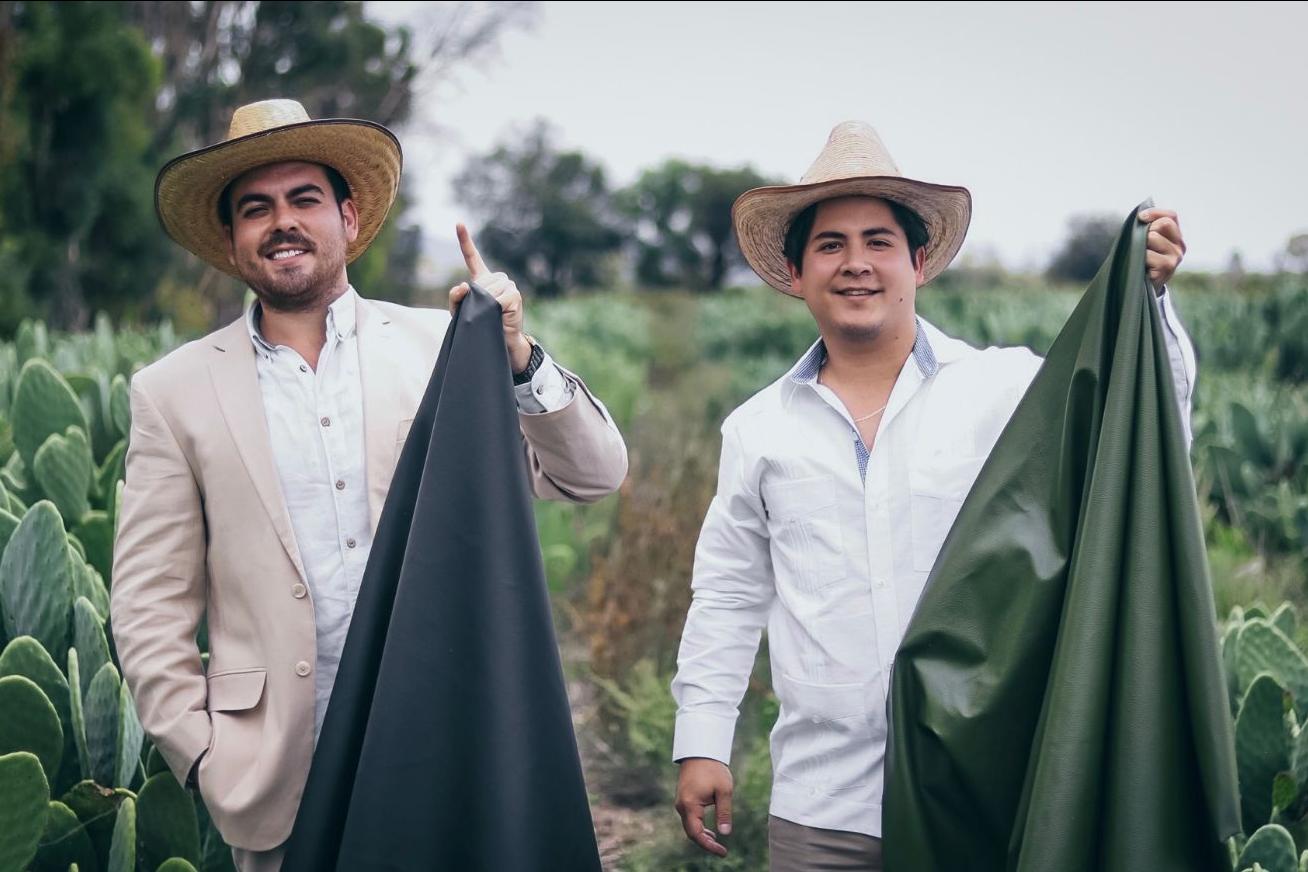 Adrián and Marte - founders of Desserto - holding their alternative leather made from cactus