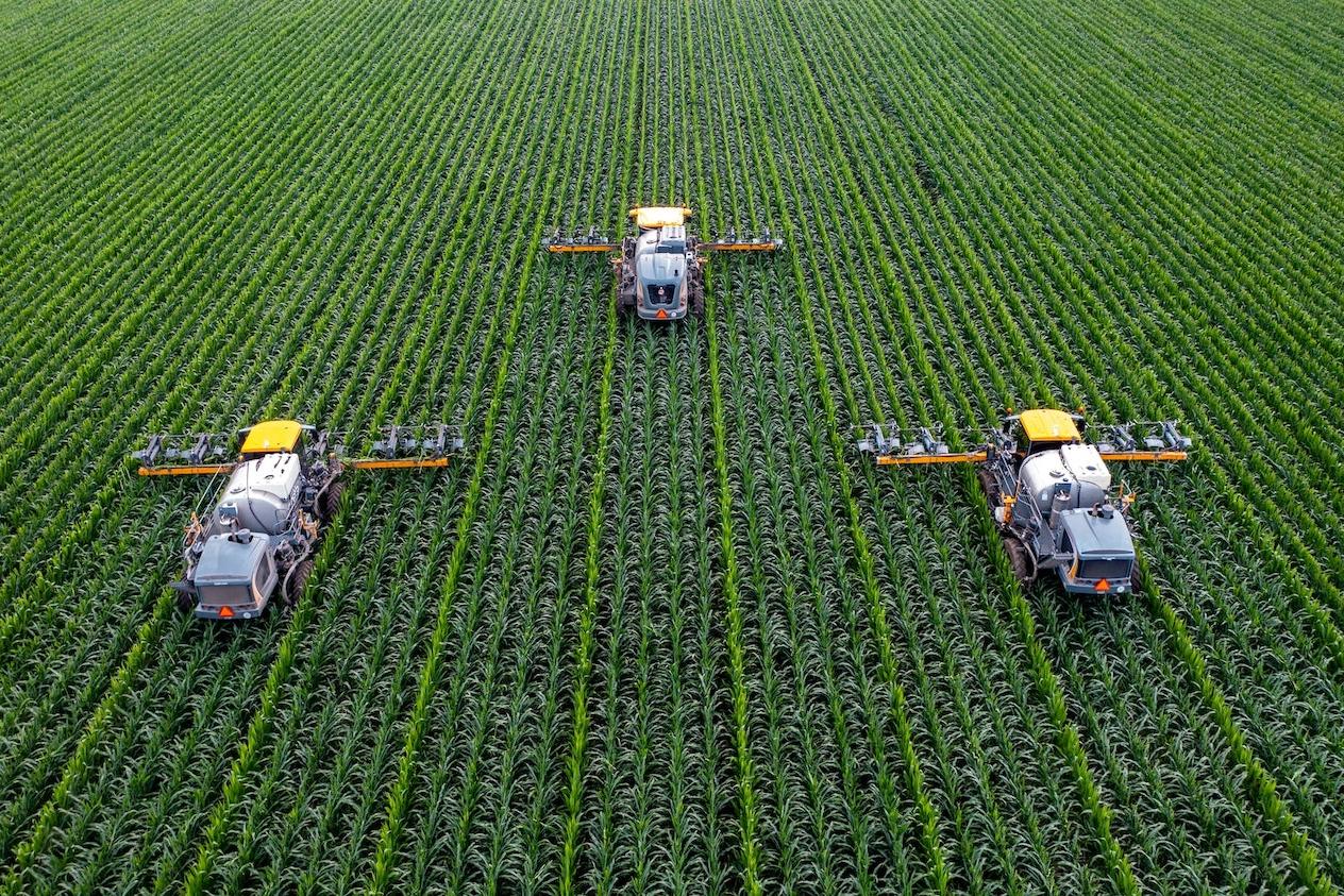 Aerial shot of tractors in field - new SBTi targets on land use