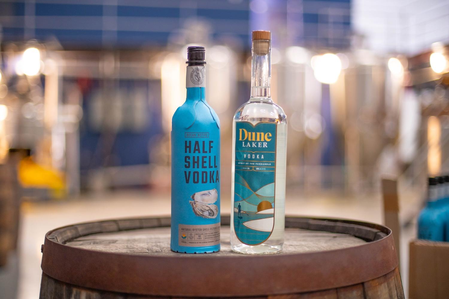 https://back.3blmedia.com/sites/default/files/styles/ratio_3_2/public/triplepundit/wide/Distillery%2098%20Half%20Shell%20vodka%20packaged%20in%20paper%20bottles%20and%20Dune%20Laker%20Vodka%20packaged%20in%20glass%20bottles.jpg?h=e71b205b