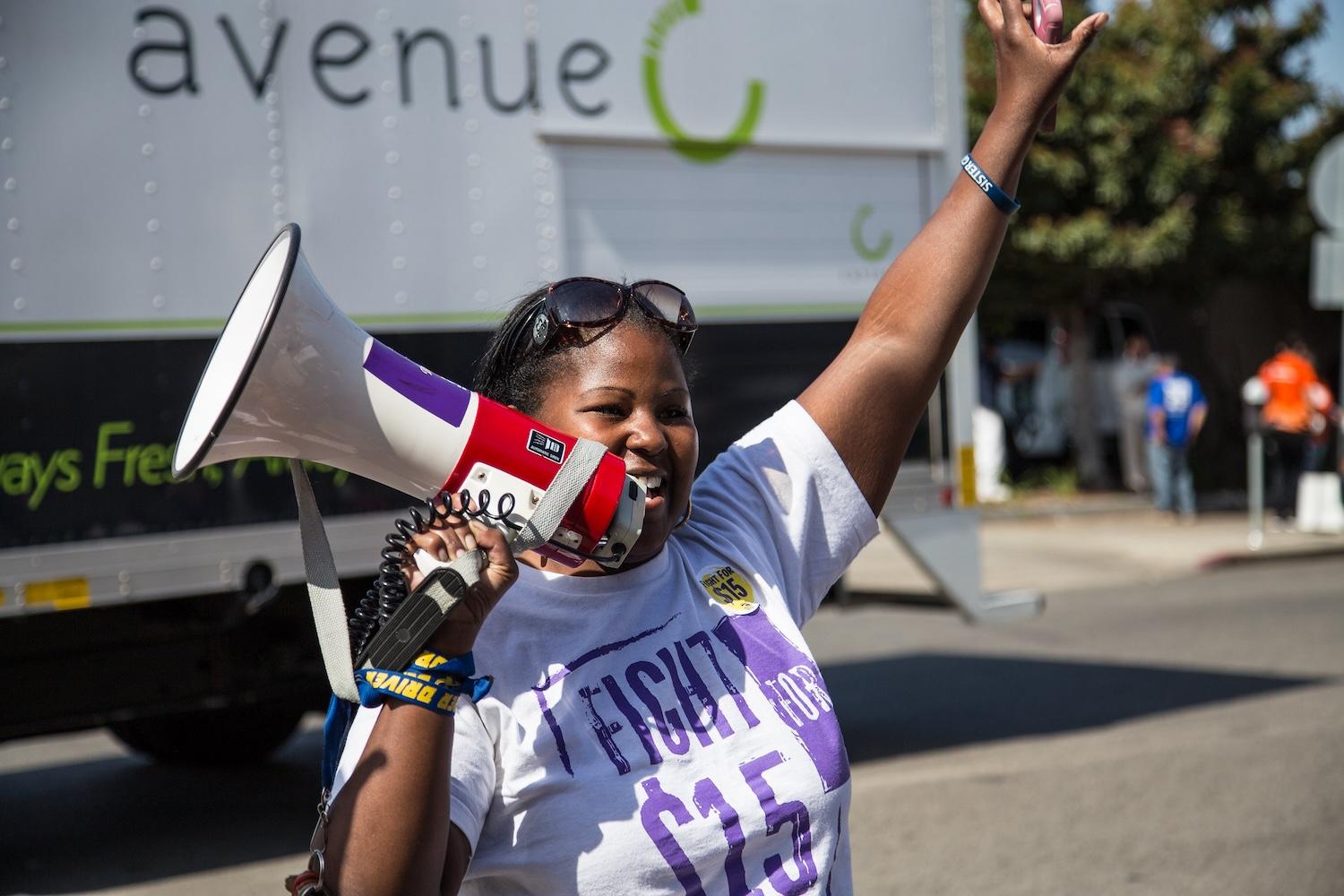 Fight for $15 demonstration in Los Angeles in 2015 - social solutions for equity 