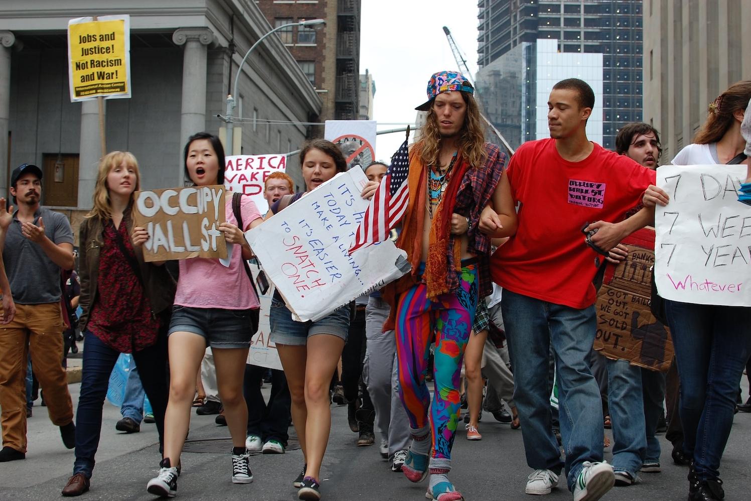 Occupy Wall Street protesters new york city 2011 - people pushing for economic solutions and economic equity