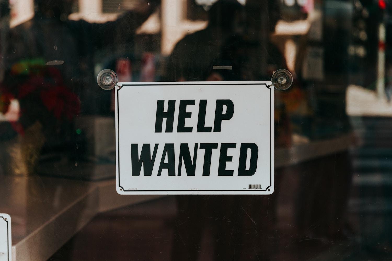 help wanted - hiring sign in window - second chance hiring for people with criminal justice histories