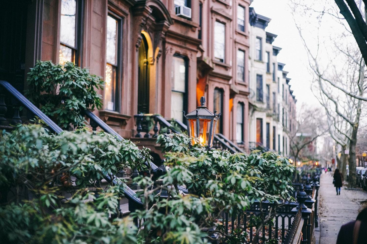 new york brownstones with trees