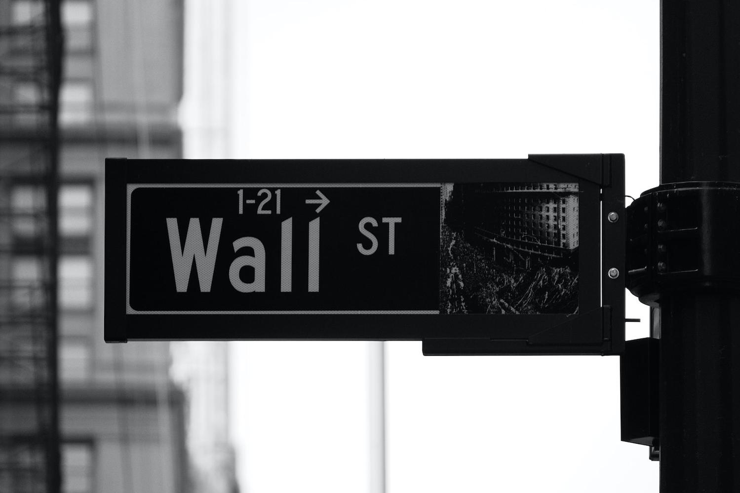 wall street sign - new york stock exchange - anti-esg policies threaten ESG investing
