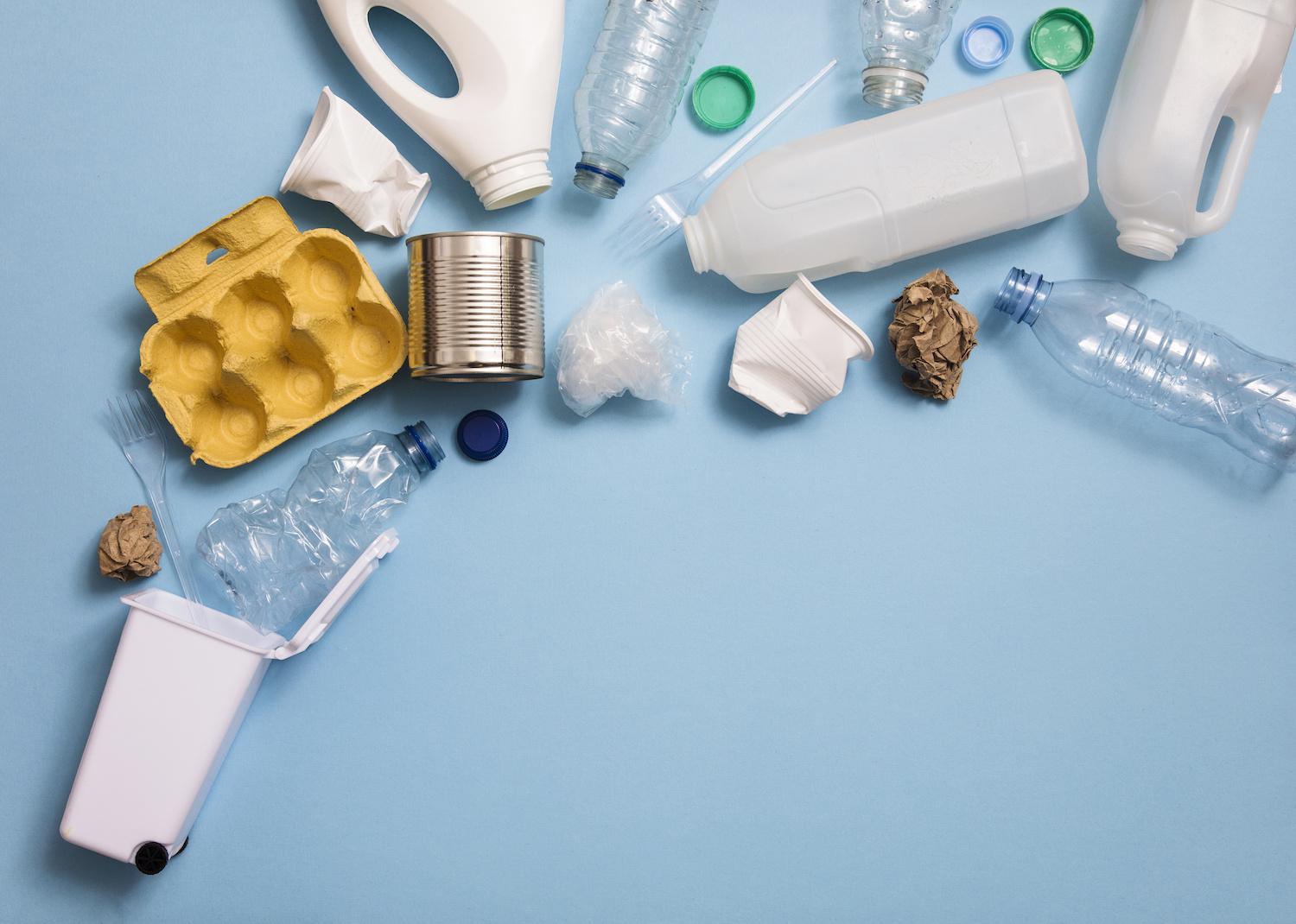 Packaging Materials Going into a Recycling Bin - Circular Economy