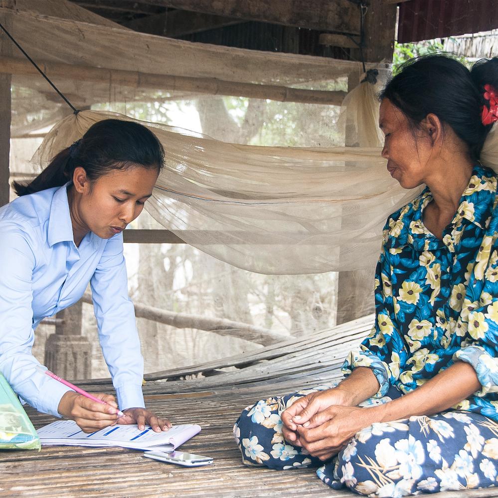 Two women participating in iDE's WASH sanitation program in Cambodia.
