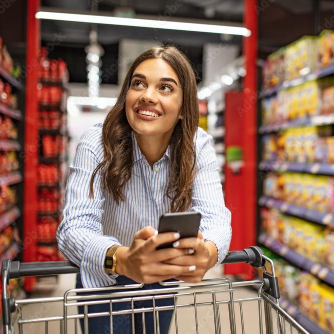 Woman shopping in grocery store - consumer trends consumer perception