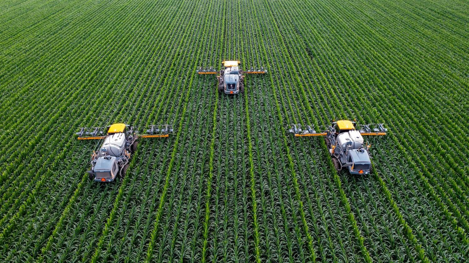 Aerial shot of tractors in field - new SBTi targets on land use