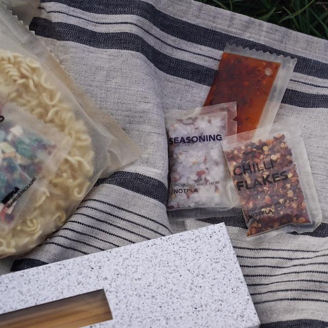 Notpla's thin-film plastic alternative sachets made from seaweed.
