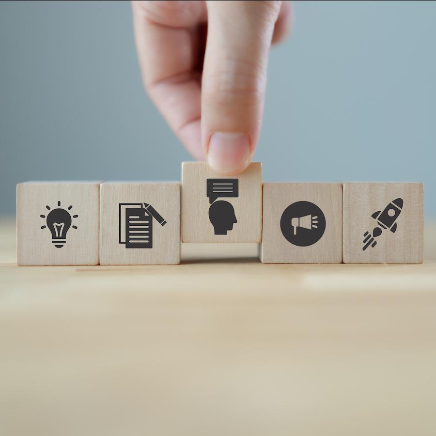 ESG communications - wooden tiles representing ideas