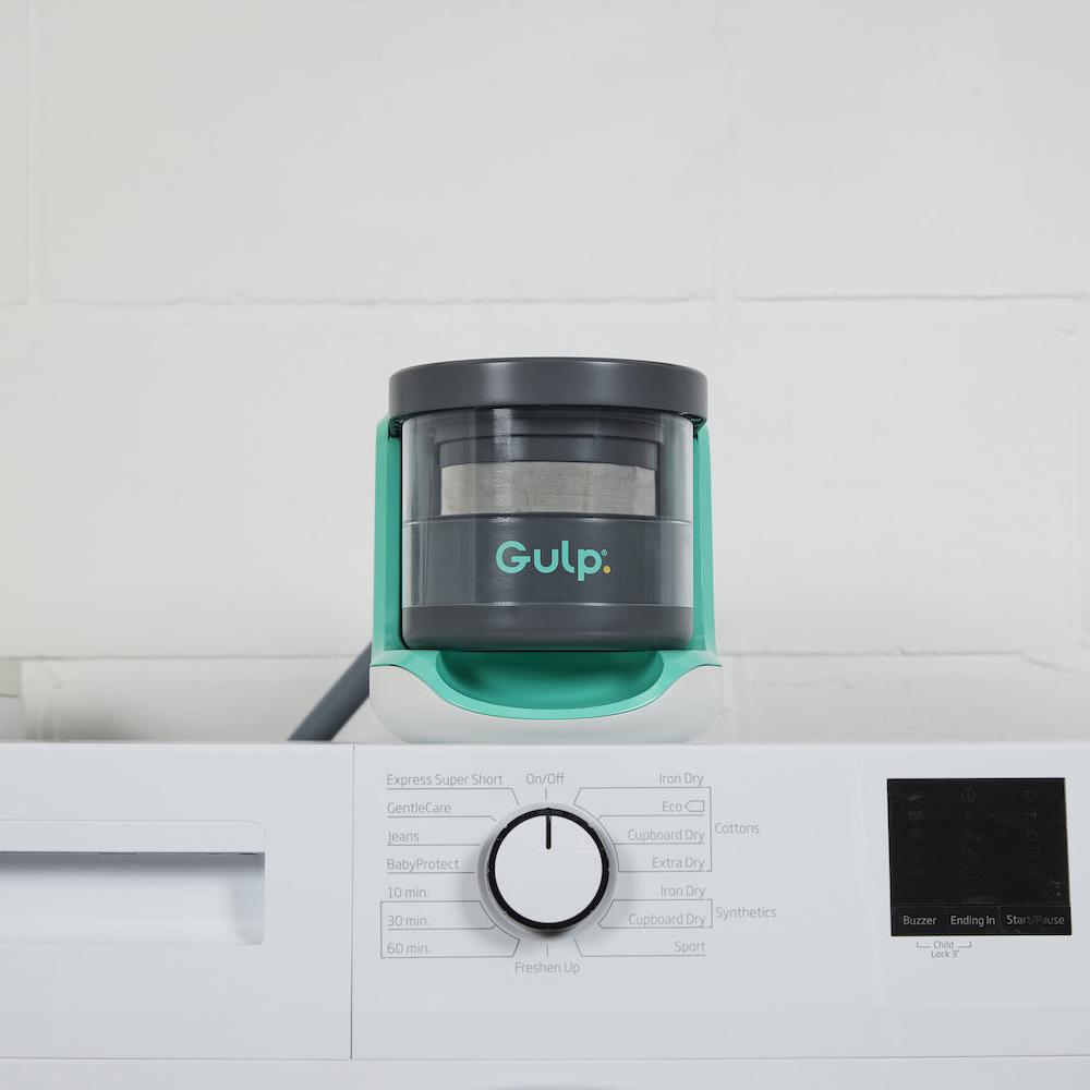The Gulp microfiber filter sits on top of a washing machine —  this device captures Microplastic Particles