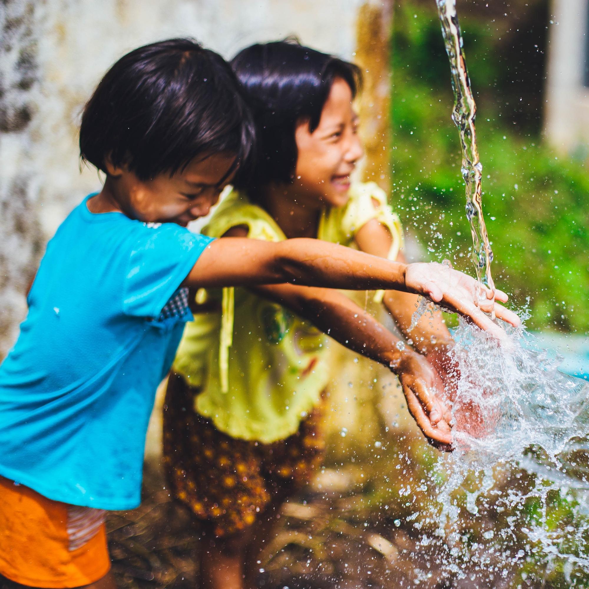 children playing in water