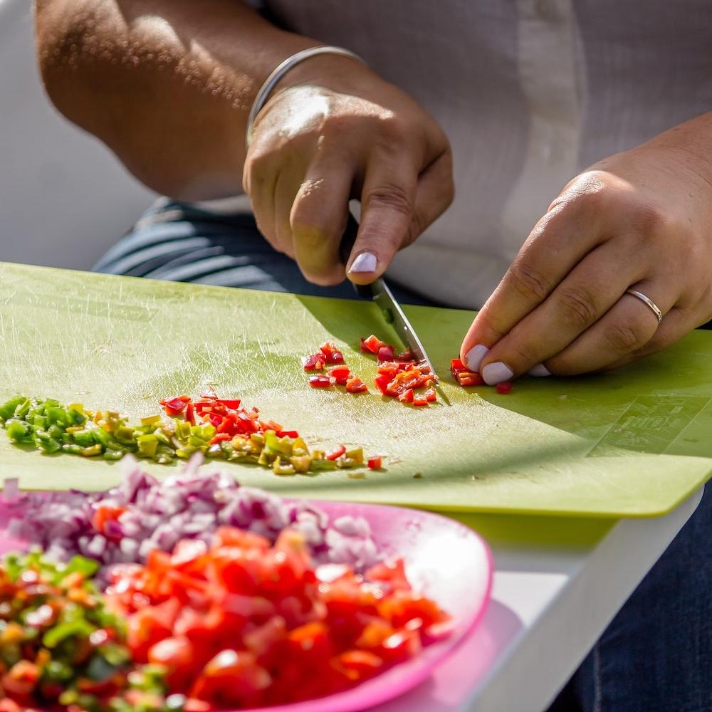 Woman Preparing a Healthy Meal - Fight Hunger and Improve Nutrition