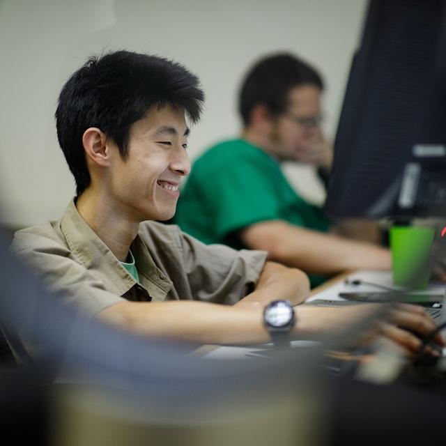 An employee working on a computer — Auticon