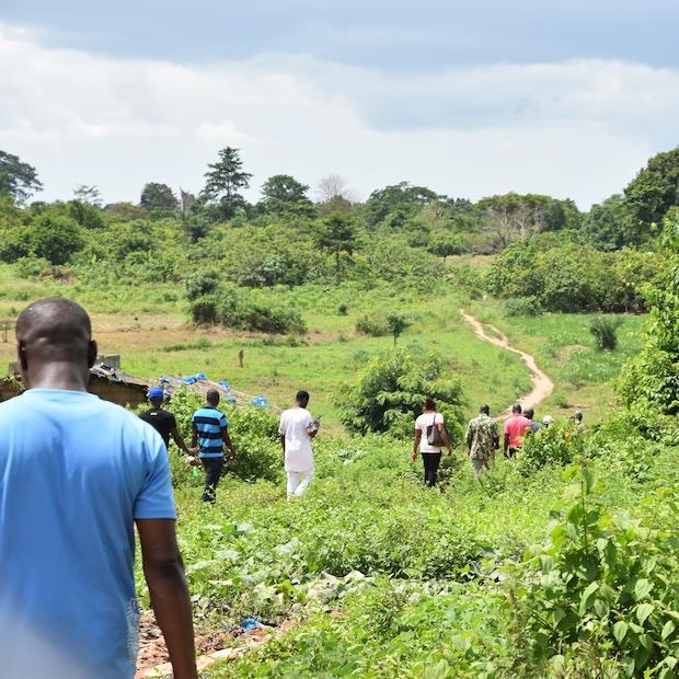 cocoa farmers on their farm — how farmers are coping with climate change