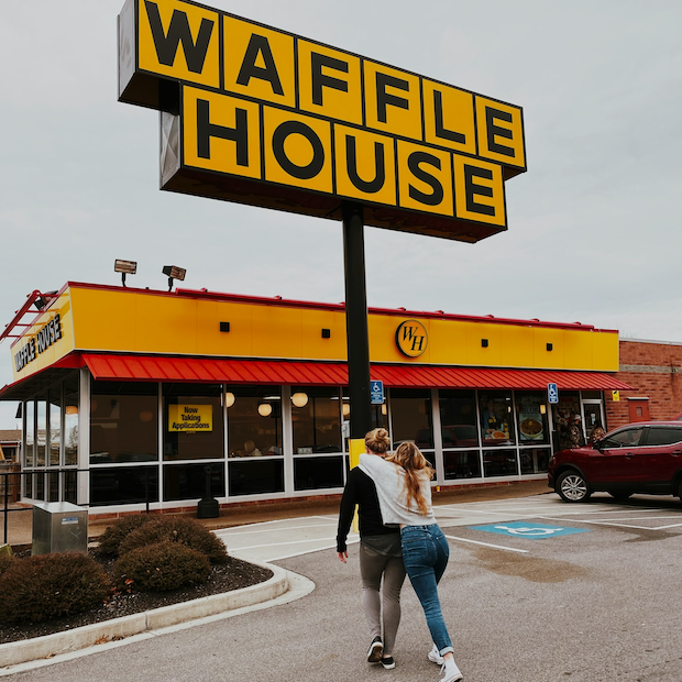 couple going into waffle house 