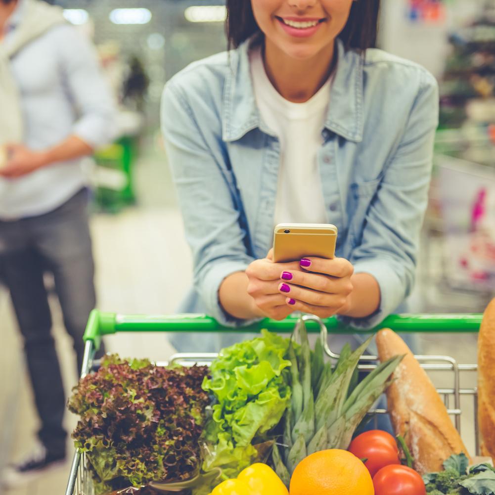 couple shopping in the grocery store - what ESG issues matter to consumers as they shop