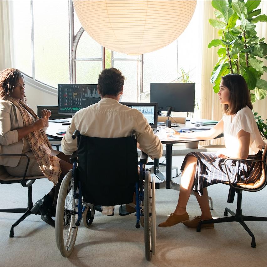 coworkers in a meeting - diversity and inclusion D&I