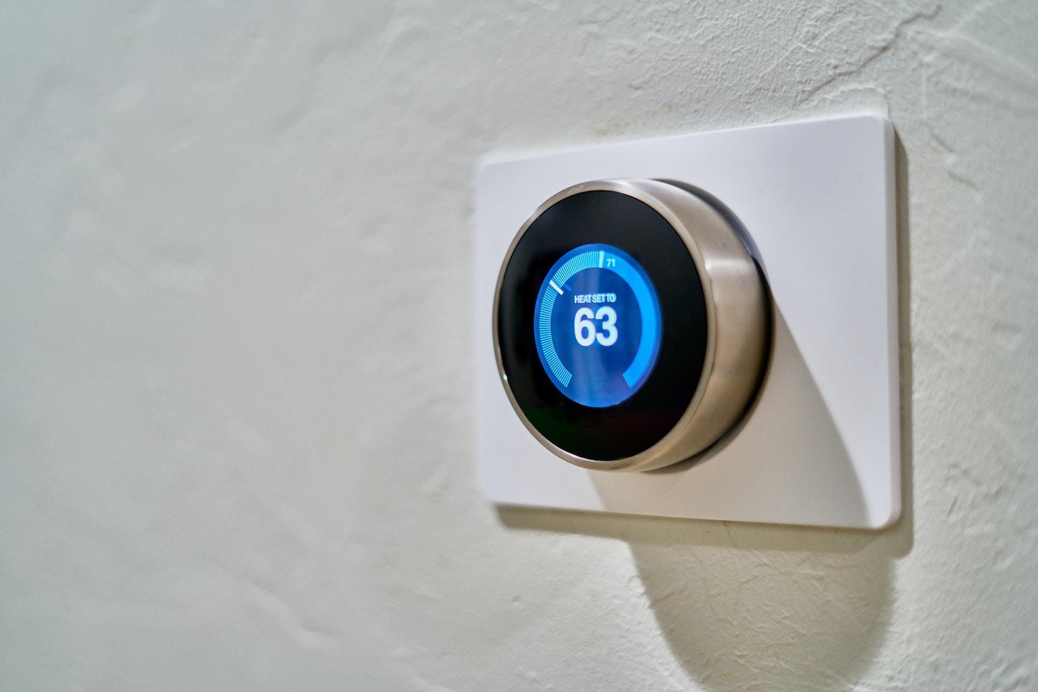 A thermostat on a wall. 