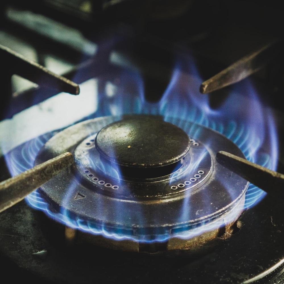 gas stove with fire - cooking with gas stoves