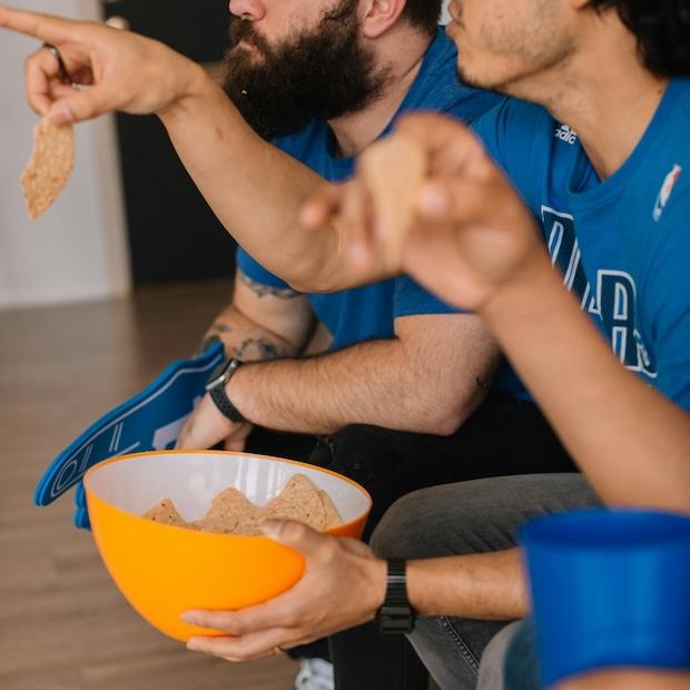 guys eating snacks and watching the super bowl.jpg