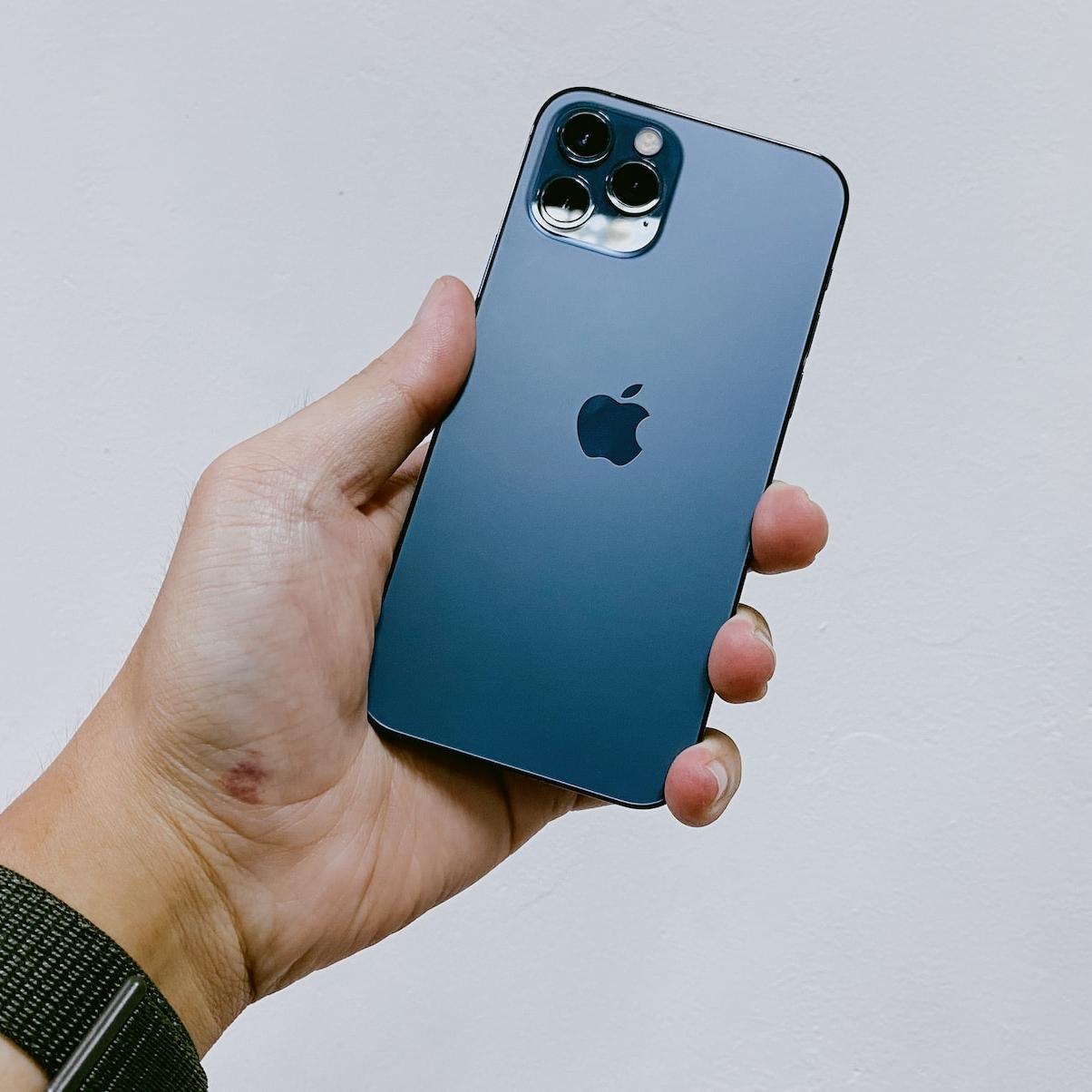 man holding iPhone 