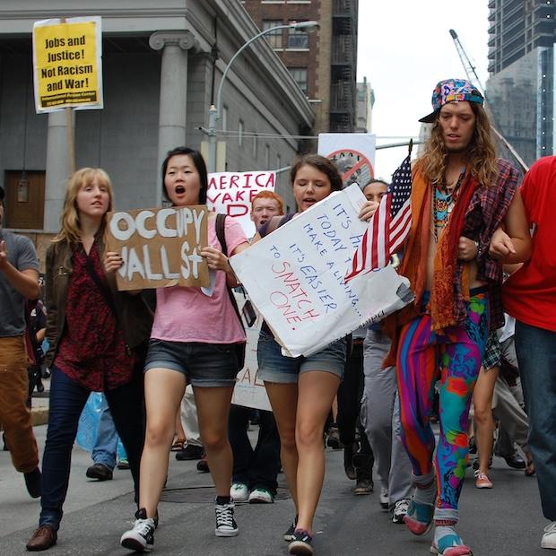 Occupy Wall Street protesters new york city 2011 - people pushing for economic solutions and economic equity