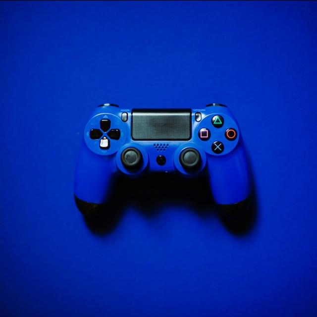 A video game console controller. 