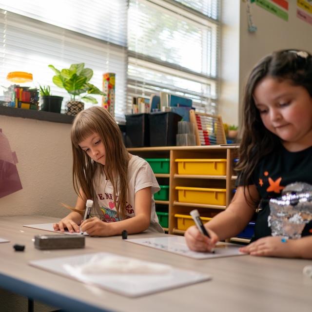 students in a classoom - Subaru and AdoptAClassroom