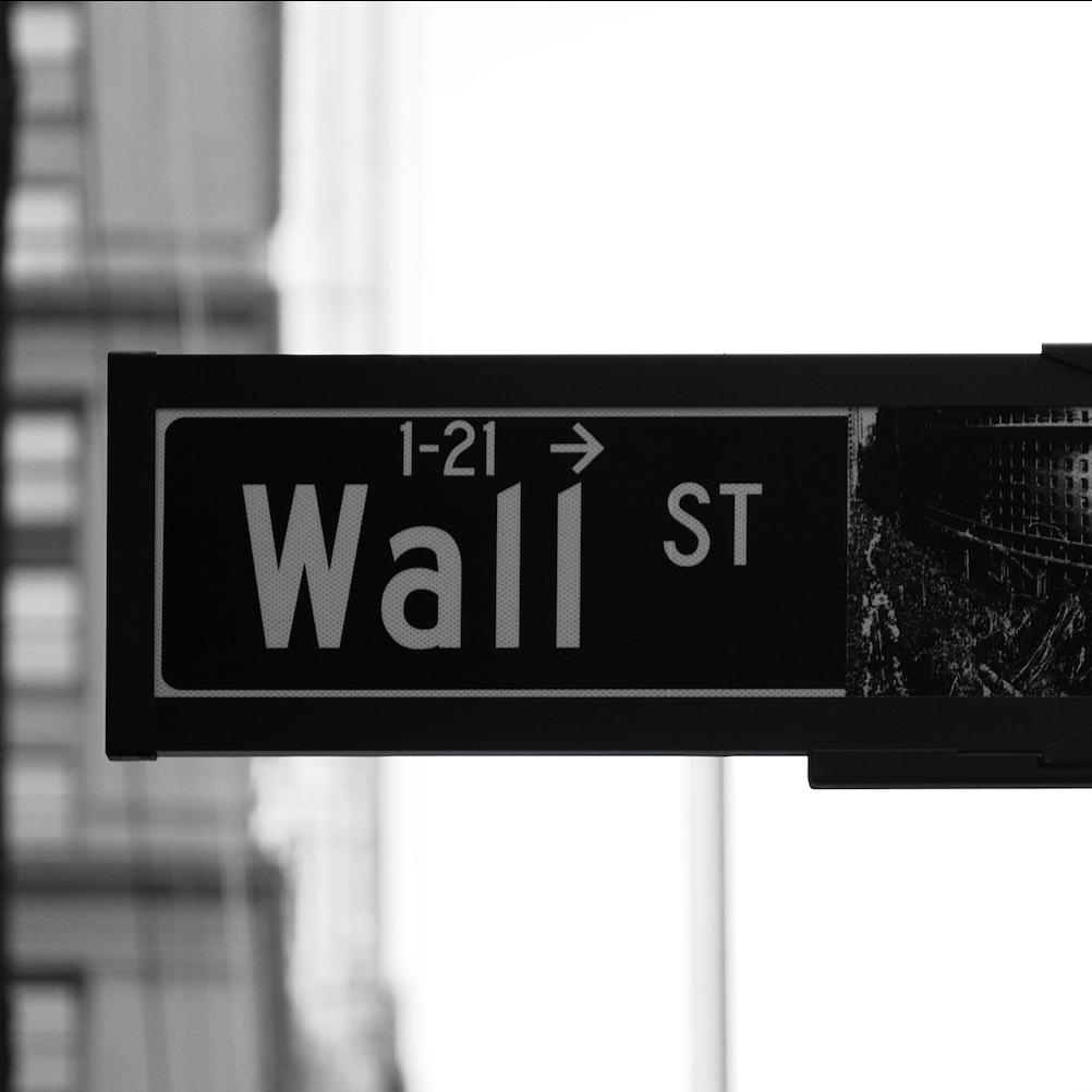 wall street sign - new york stock exchange - anti-esg policies threaten ESG investing