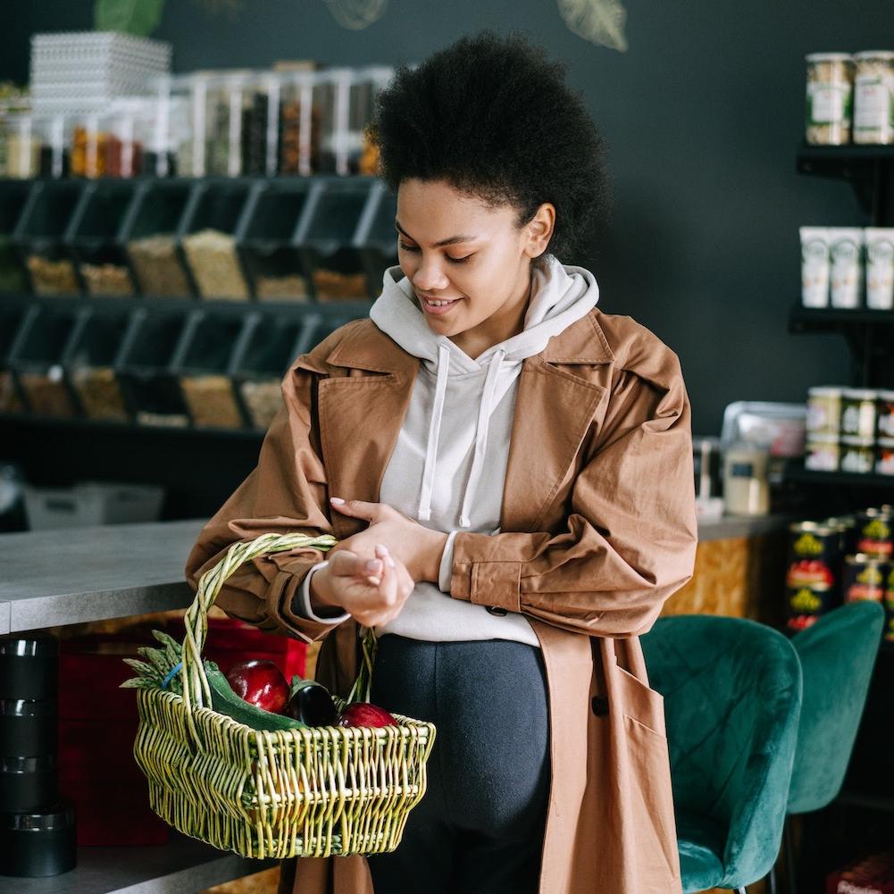 woman grocery shopping - more regenerative agricultgure certification coming soon to grocers